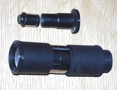 A comparison of the standard 7/8 eyepiece and microscope top tube section.
New top tube section turned from ABS plastic to fit lower microscope tube section and 2 eyepiece.
New top tube section is same length as old.