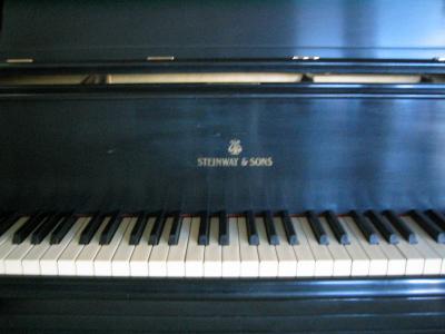 It's a Steinway (sorry about the crummy focus)