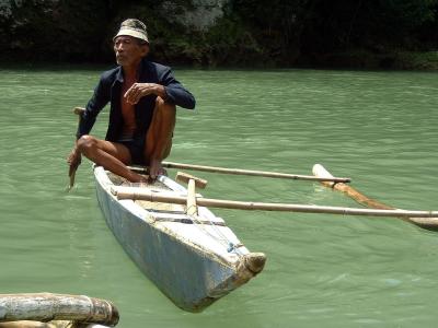 Paddling his Canoe