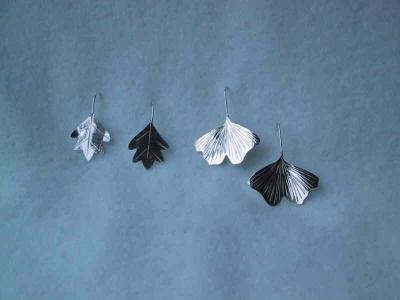 Hand shaped & hammered leaves made from sterling silver.