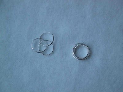 Sterling silver Russian wedding band style rings (3 interlocked rings).