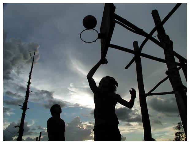 Playing basketball in Kitaotao, Bukidnon