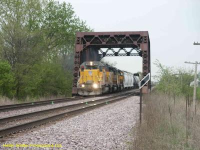 Engine 3033 leads train thru bridge 4-21-2005.jpg