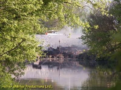 creekbed full of bridge  & train debris.jpg