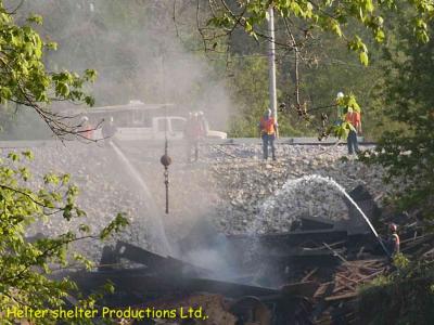 firefighters put out fire in creekbed.jpg