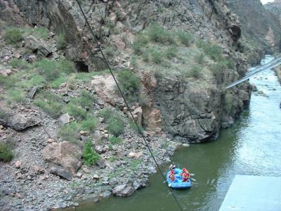Raft and Cave on River
