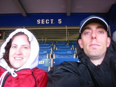Trying to stay dry while watching the Mets