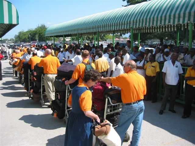 waiting in line to put our luggage on the truck