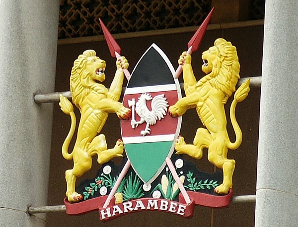 Kenyan Coat of Arms. Harambee means pulling all together at once.