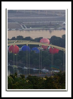 Balloons rise at the point
