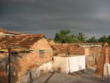 Between roofs just before the rainstorm.jpg