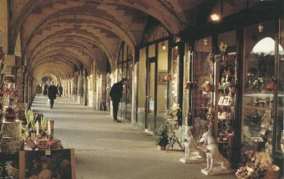 Arcade surrounding Place des Vosges: Consists of 36 old, attached mansions with two upper floors & porticos on ground floor.