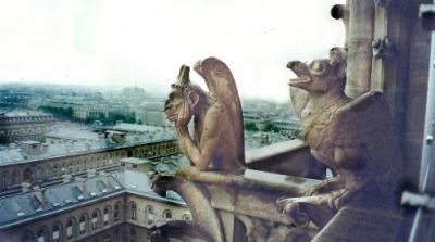 Gargoyles from top of Tower of Cathedral of Notre Dame. These grotesque beasts represent souls caught between heaven & earth.