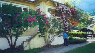 Judy at the side of the Hotel Regina in Wengen
