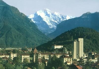 Interlaken with the Alps in the background. Interlaken is a major commercial center for the Berner Oberland area.