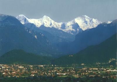 Interlaken with the Alps in the background. Interlaken is in a valley.