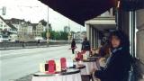 Judy having dinner at an outdoor cafe on the Right (east) Bank, next to the Limmat River. (1)