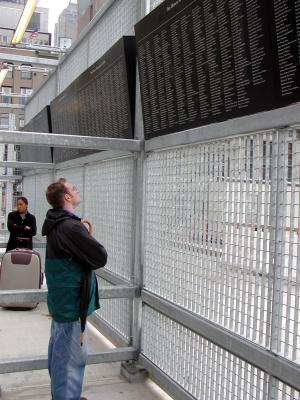 Dan views the list of names at Ground Zero