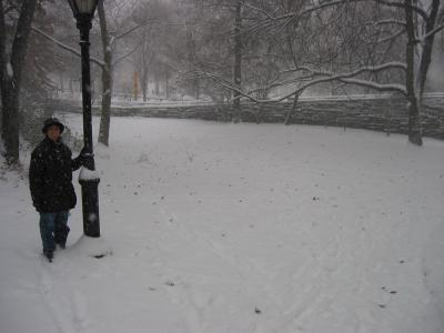 Chelle poses next to a light pole in Central Park. The snow was getting very deep at this point.