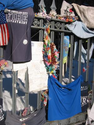 Numerous memories from far away cities as Los Angeles were put on the fence in tribute to the victims.