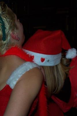 OH MY! SANTA! What are you doing to Santa? Mistletoe in your bra, did you say?