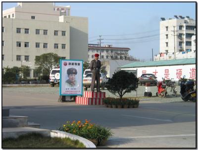 Guard to entrance of parking area of hospital