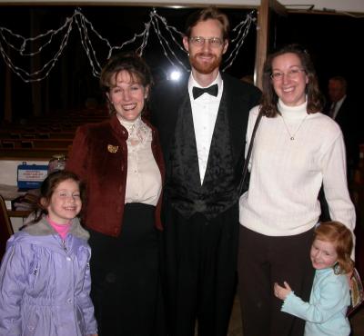 Pat with his two wives and kids.