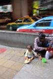 Woman and child begging near Patpong