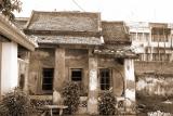 Same dilapidated building in sepia and in landscape