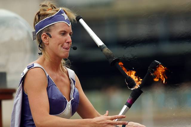 Female fire juggler
