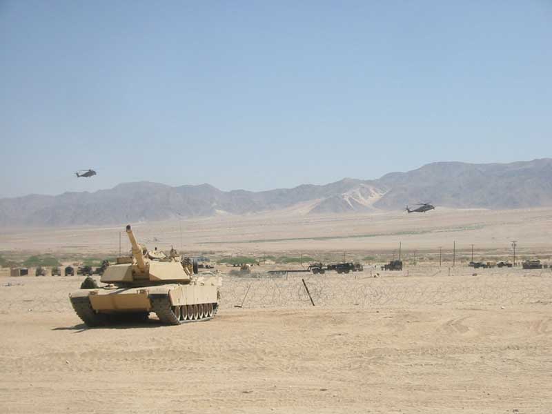 M1A1 with CH-53s flying in background