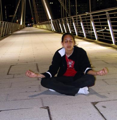 Natasa meditating on Hungerford Bridge