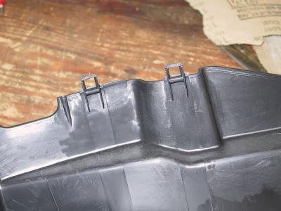 Damn pesky snaps that hold the column cover on (bottom cover)
