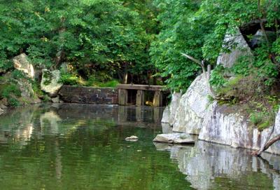 An old footpath bridge at a cove in the canal