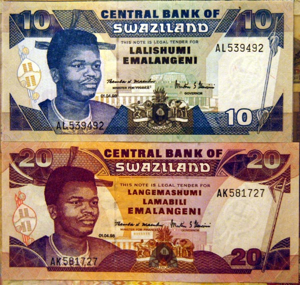Swaziland issues it's own currency, the Emalangeni, which is pegged to the South African Rand, which is accepted everywhere