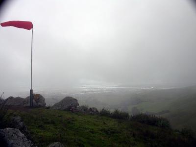 The windsock displays the gusting winds.