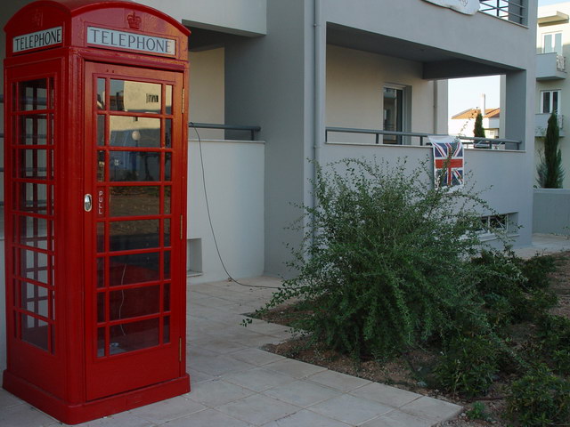 ...and the British without their traditional phone booth!