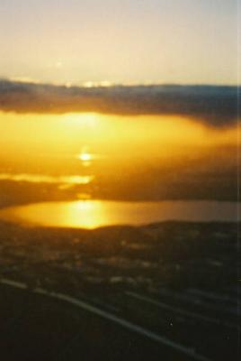 Blurry photo but you can see how flat Holland really is by the suns reflection off river/canals in the distance.