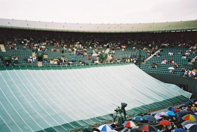 Play was stopped for rain. You can see my blue and white Umbrella in the bottom middle of the photo.