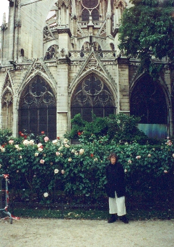 Judy at the side of the Cathedral of Notre Dame