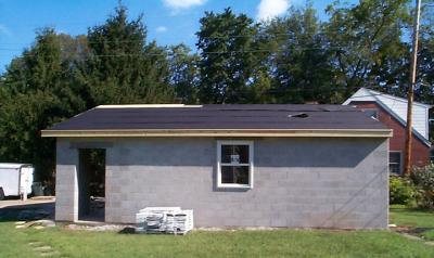 Exterior with roofing paper.