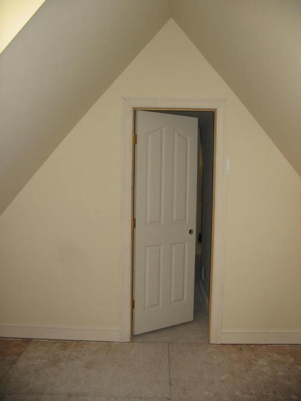 From the attic area, a door to the garage bath