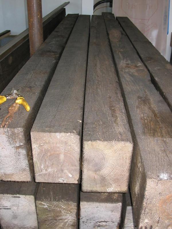 NEXT WEEK, 9/25 - Wood flooring installed, then these stained beams go up in the great room