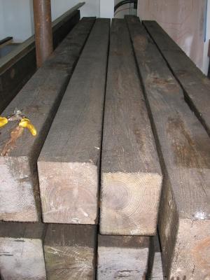 NEXT WEEK, 9/25 - Wood flooring installed, then these stained beams go up in the great room