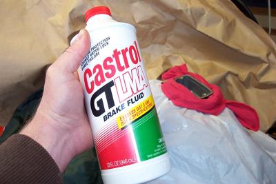 New Castrol DOT 4 fluid in a sealed bottle.  I used almost the whole thing by the time I was done.