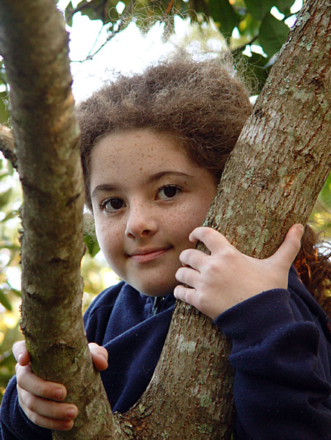 Girl Through Branches