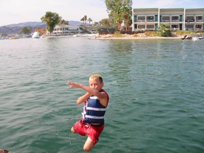 Zak Exiting Boat at Havasu, 9/02