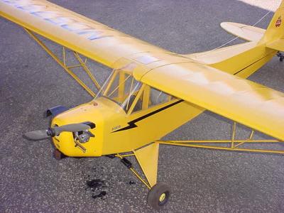 piper cub airplane with 2 cycle motor