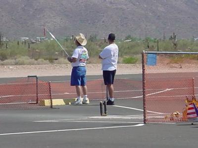 flying a model airplane with a spotter