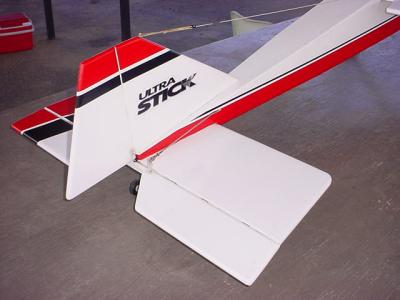 airplane horizontal stabilizer and vertical stabilizer photo taken with flash